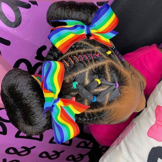 Black girl hairstyle with, colorful bow for school