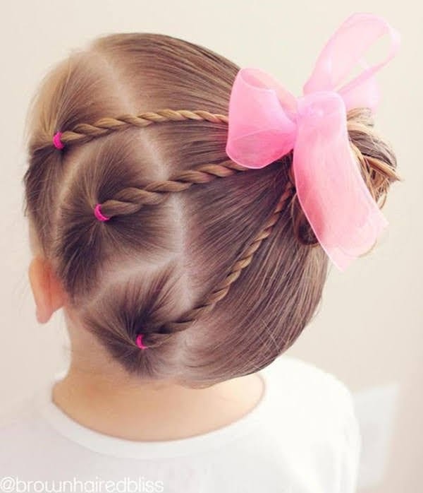 Light pink Christmas bow hairstyle ideas for kids 