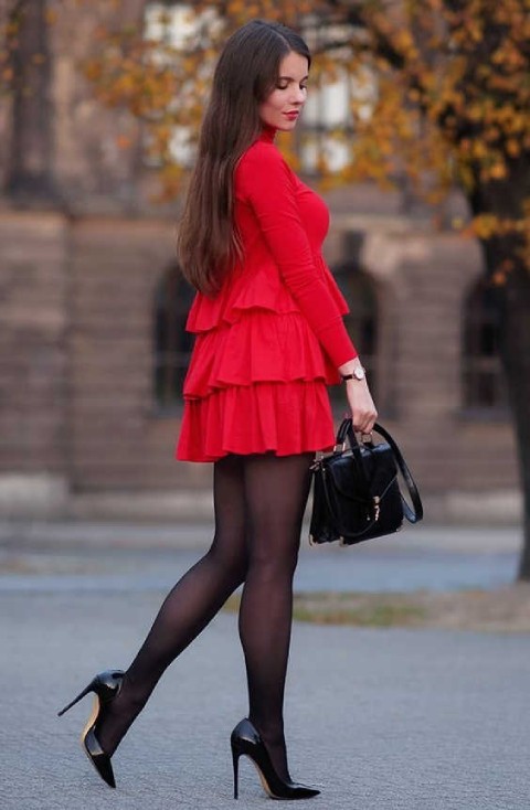 Red cocktail frill dress pantyhose black and black heels 